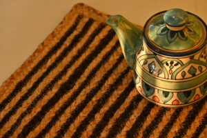 Handmade Square Beige and Black Minimalist Design Jute Braided mat.